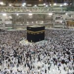 A Group of People Standing Near the Kaaba