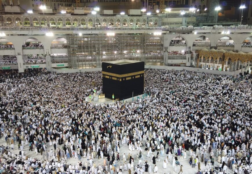 A Group of People Standing Near the Kaaba